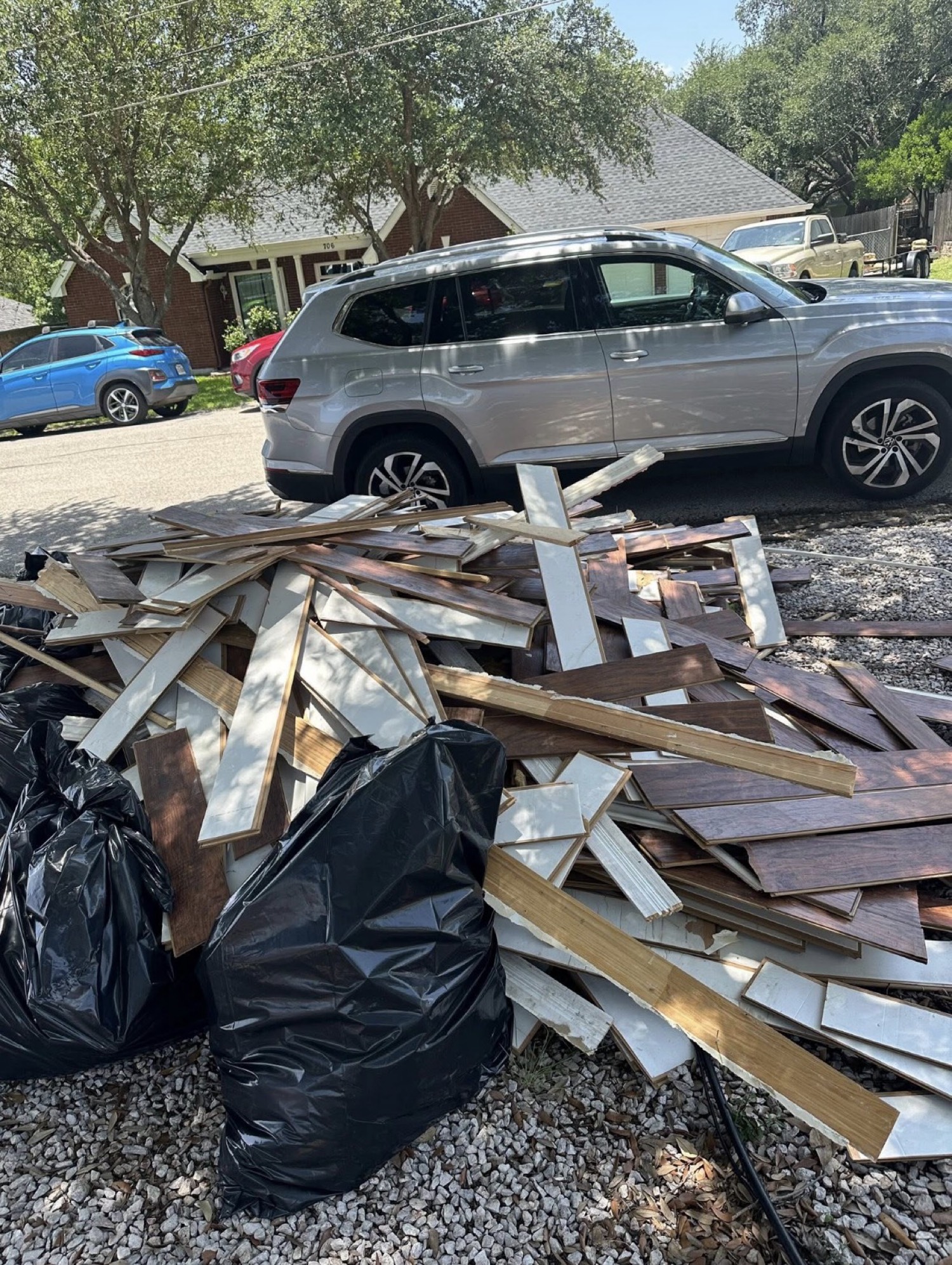 Piles of removed flood-damaged flooring